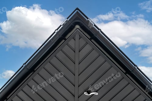 Preview: A modern graphite herringbone roof lining is attached to the trusses