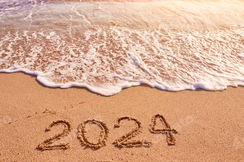 Visualização: Ano 2024 escrito em areia, praia, mar em dia ensolarado