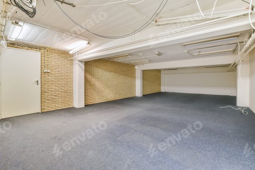 Preview: Empty Room with Brick Walls and Gray Carpet