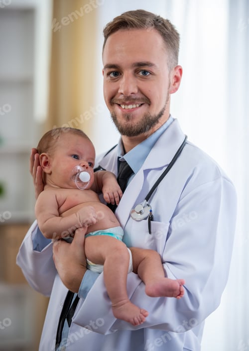 Preview: Pediatric Doctor Holding Newborn Baby After Medical Checkup.