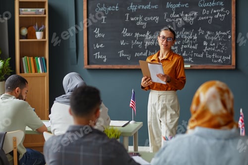 Preview: Caucasian Adult Woman Teaching Multiethnic Students in Language School Classroom