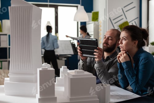Preview: Colleagues of architectural profession work at office