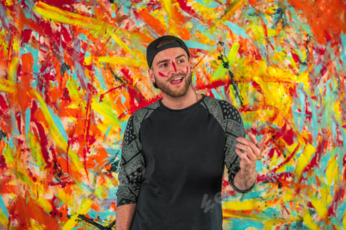Preview: Portrait of a smiling Caucasian male with red lines on the face