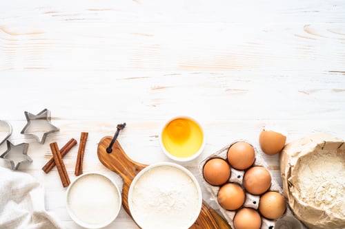 Preview: Baking ingredients at white wooden table