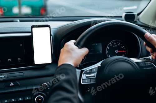 Preview: Blank empty screen smartphone on holder in car use for Navigation or GPS. Car interior view