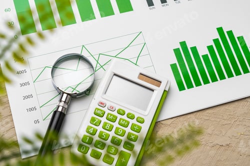 Preview: Financial paper with charts and diagrams on gray table