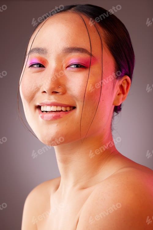 Preview: Face, makeup and beauty with a model asian woman in studio on a gray background to promote a cosmet