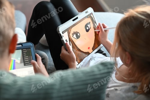 Preview: A girl and a boy are having a screen time and playing some video games and drawing on their iPads