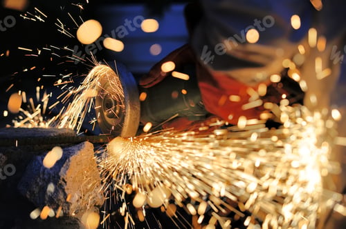 Preview: Worker cutting metal with grinder