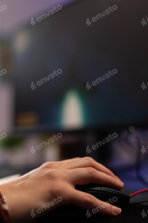 Preview: Close up of woman using mousepad to play video games