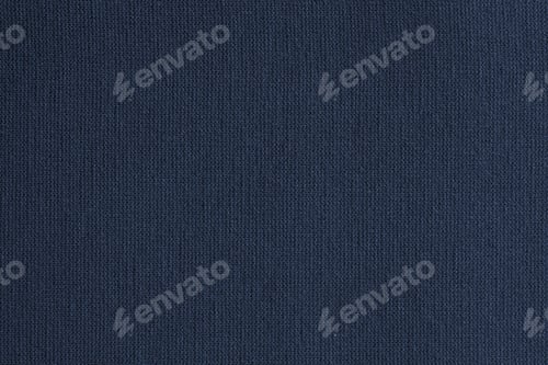 Preview: Texture Of A Knitted Cloth Or Textile Material Closeup For A Uniform Background Or For Wallpaper Of