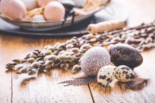 Preview: Easter eggs with pussy-willow branch on wooden kitchen table