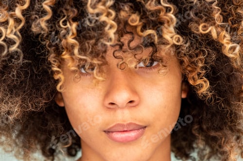 Preview: Close up African American girl with afro hair staring