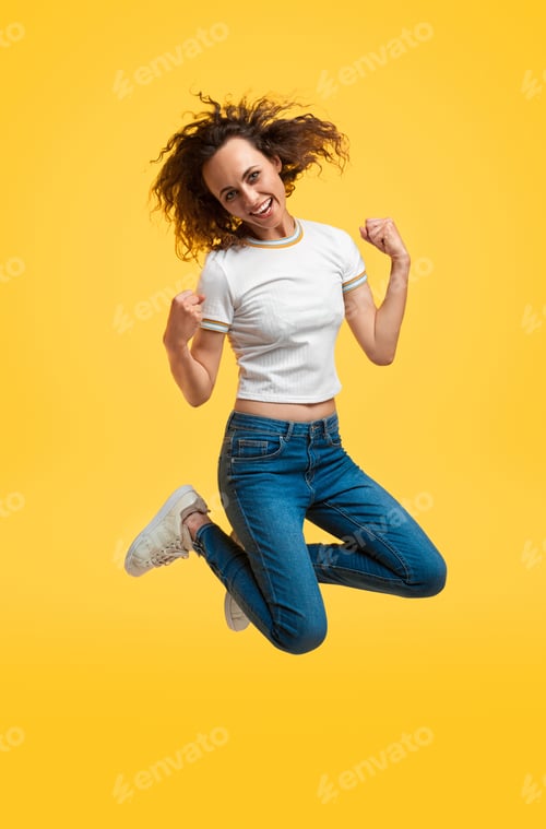 Preview: Woman jumping and celebrating success