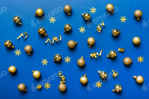 Preview: Christmas composition. a pattern of christmas balls on colored background. Flat lay