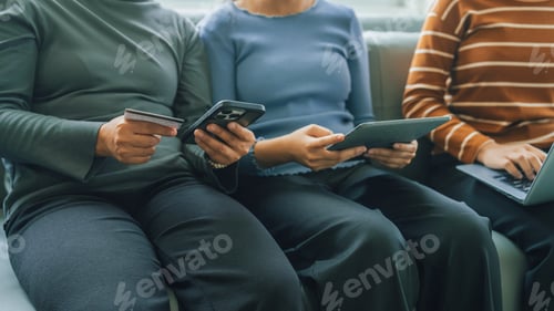 Preview: My device of three people as mother, daughter and friends watching social media news, using laptop