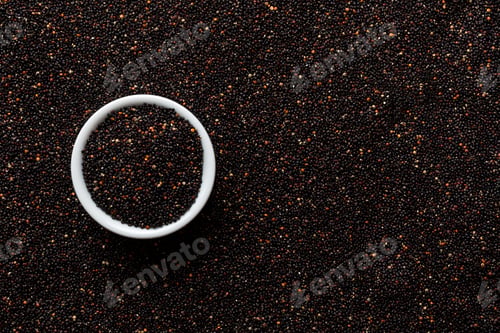 Preview: black quinoa grain in wooden bowl background and texture of gluten free top view