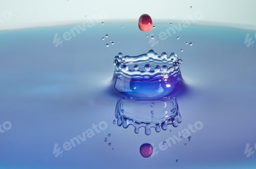 Preview: Abstract background color water splash, collision of colored drops and crown creation