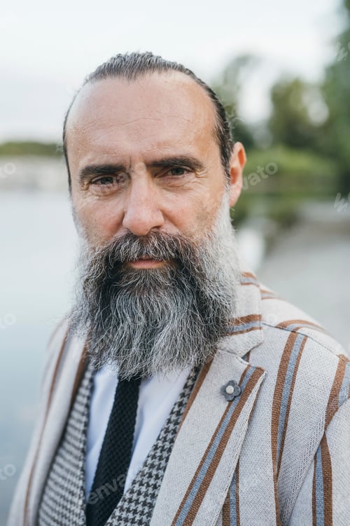 Preview: Man standing by lake