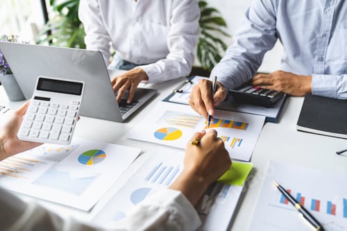 Preview: business people meeting in the office Calculate the tax and income of the company's investment. Stra