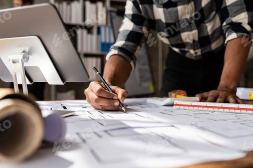 Preview: Architect man working with blueprints for architectural plan, engineer sketching a construction