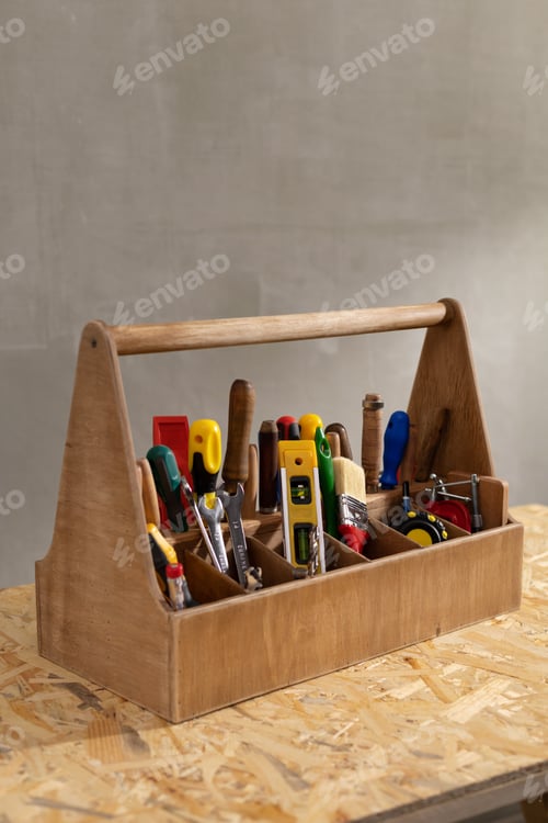 Preview: Construction tools and toolbox on wooden table background. Tools kit and tool box
