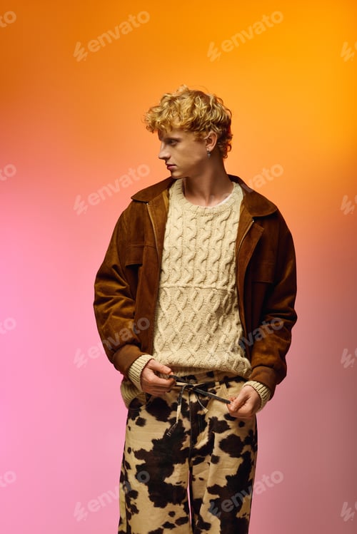 Preview: Stylish holiday fashion for men with a cozy knit sweater and trendy pants for Christmas 2025