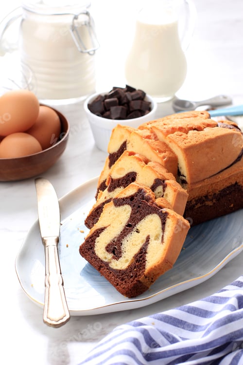 Preview: Slice Marble Cake Above Ceramic Plate