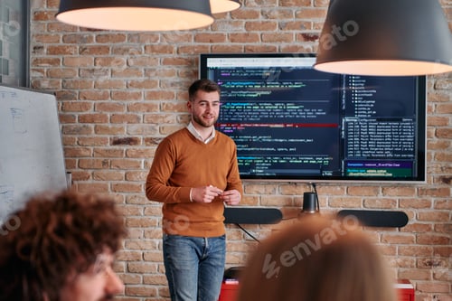 Preview: In a corporate setting businessman leads a meeting, passionately presenting a business plan to his