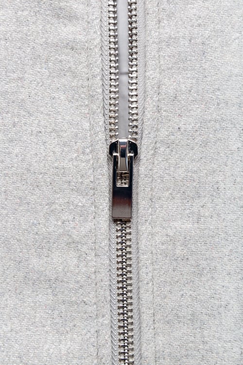Preview: Zip on woolen fabric