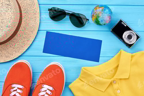 Preview: Summer Vacation Accessories on a Blue Wooden Background