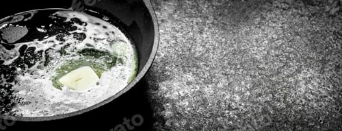 Preview: Butter in an old pan.