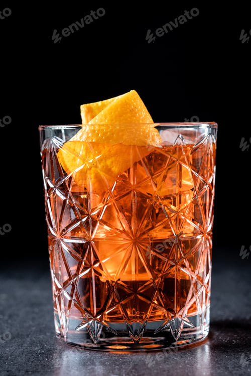 Preview: Americano cocktail garnished with twist orange on black stone