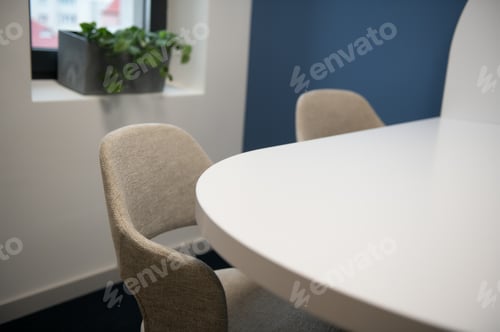 Preview: Modern meeting room interior with table and chairs