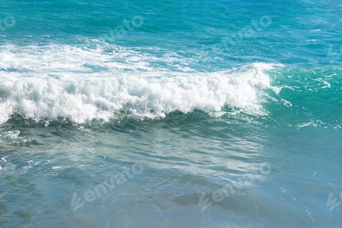 Preview: Turquoise sea close-up in bright sunlight. Colorful tropical natural background.
