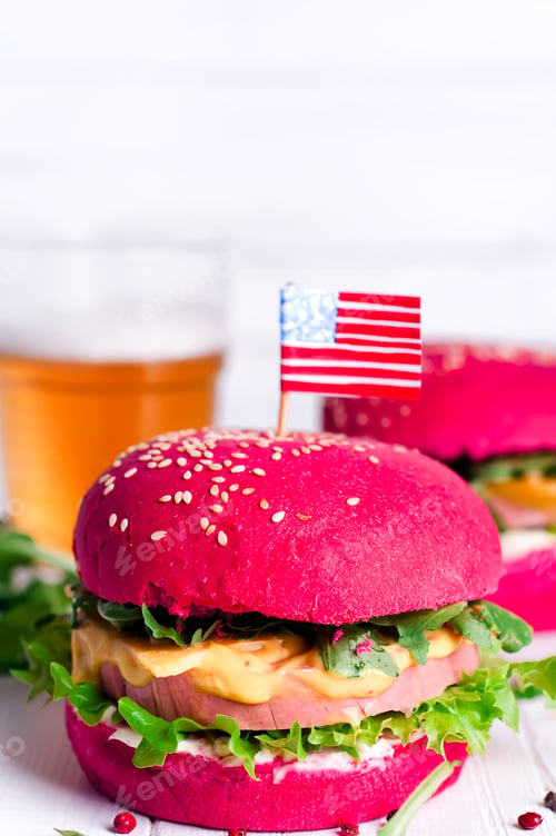 Preview: two tasty hamburgers with little American flags
