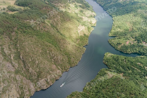 Preview: Tourist boat sailing through the Sil river canyon, Ribeira Sacra. Galicia, Spain
