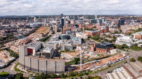 Preview: Aerial view of a Birmingham cityscape skyline with HS2 construction site