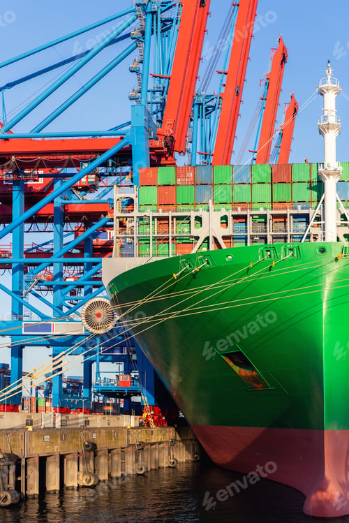 Preview: Scenic view giant cargo container ship loading Hamburg city port harbor against seaport cranes warm