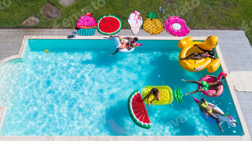Preview: Friends having fun in a swimming pool