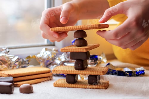 Preview: A pyramid of cookies and candies built by a teenage girl bored during the quarantine