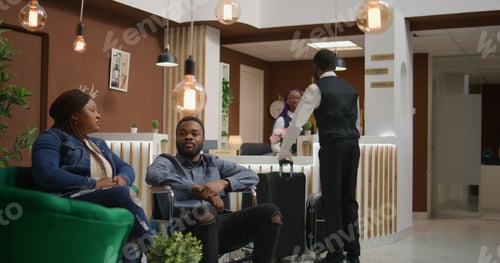 Preview: Woman wheelchair user in lounge area