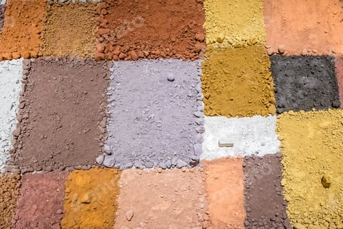 Preview: Texture of different colors of dry clay with stones