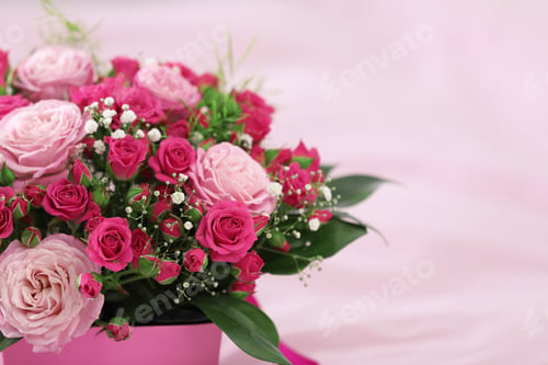 Preview: Beautiful bouquet of flowers in paper gift box on color background, closeup. Space for text