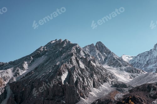 Preview: Majestic limestone mountain shining with blue sky in morning