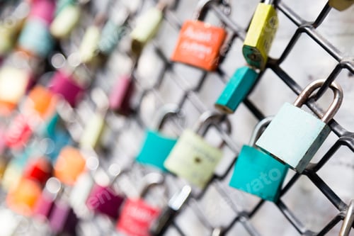 Preview: Many love padlocks on fence concept with selective focus on a blank lock at foreground