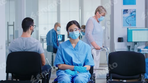 Preview: Worried nurse with face mask against coronavirus