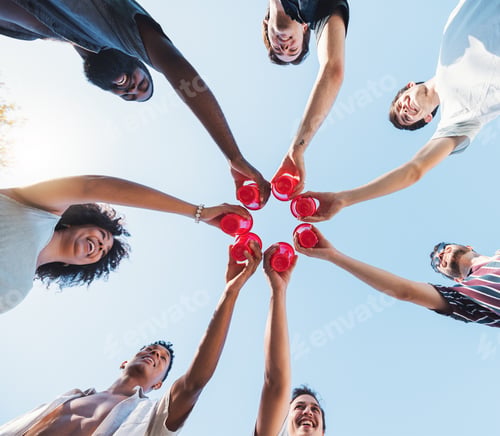Preview: Cheers, sky and alcohol with a group of friends making a toast together at a party from below. Beer