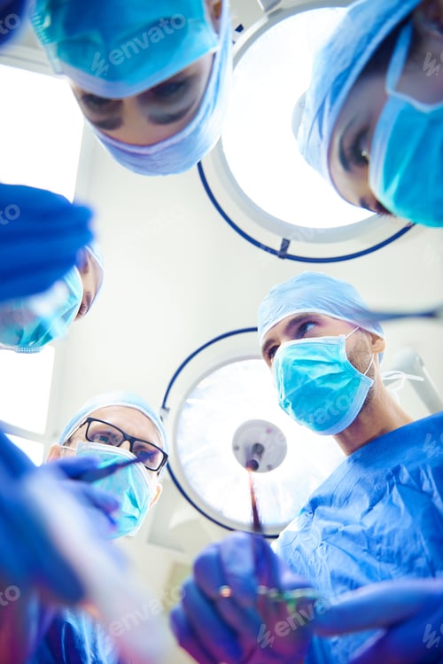Preview: Surgical Team Performing Operation in Hospital Operating Room