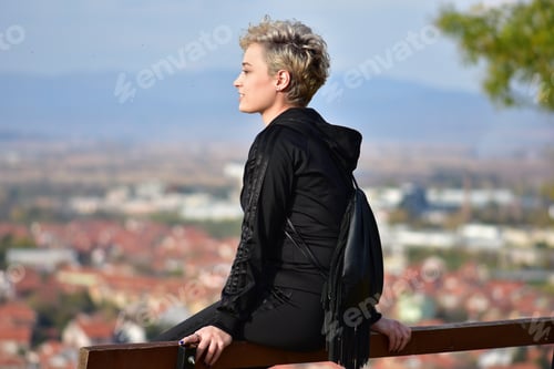 Preview: Young girl on a bench
